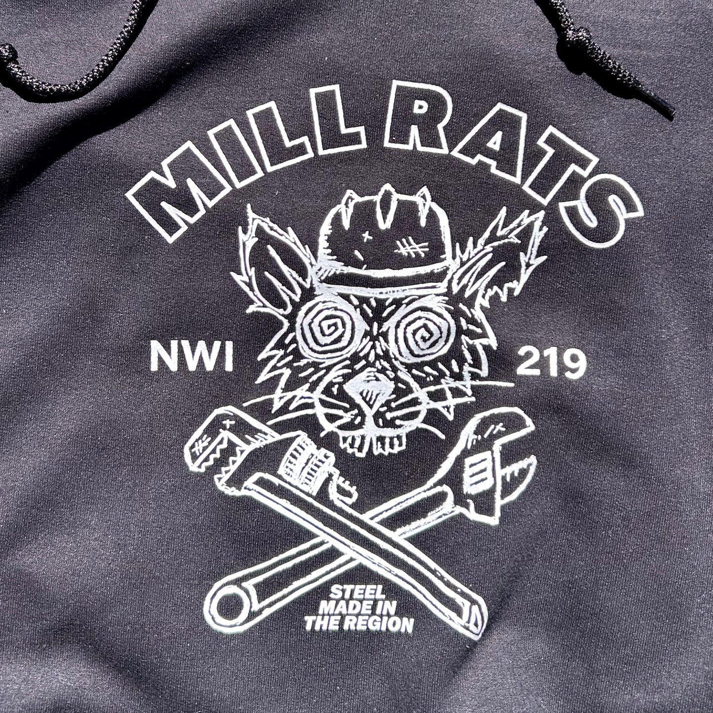 black hoodie with white graphic design featuring 'Mill Rats NWI 219' and a rat and wrenches illustration
