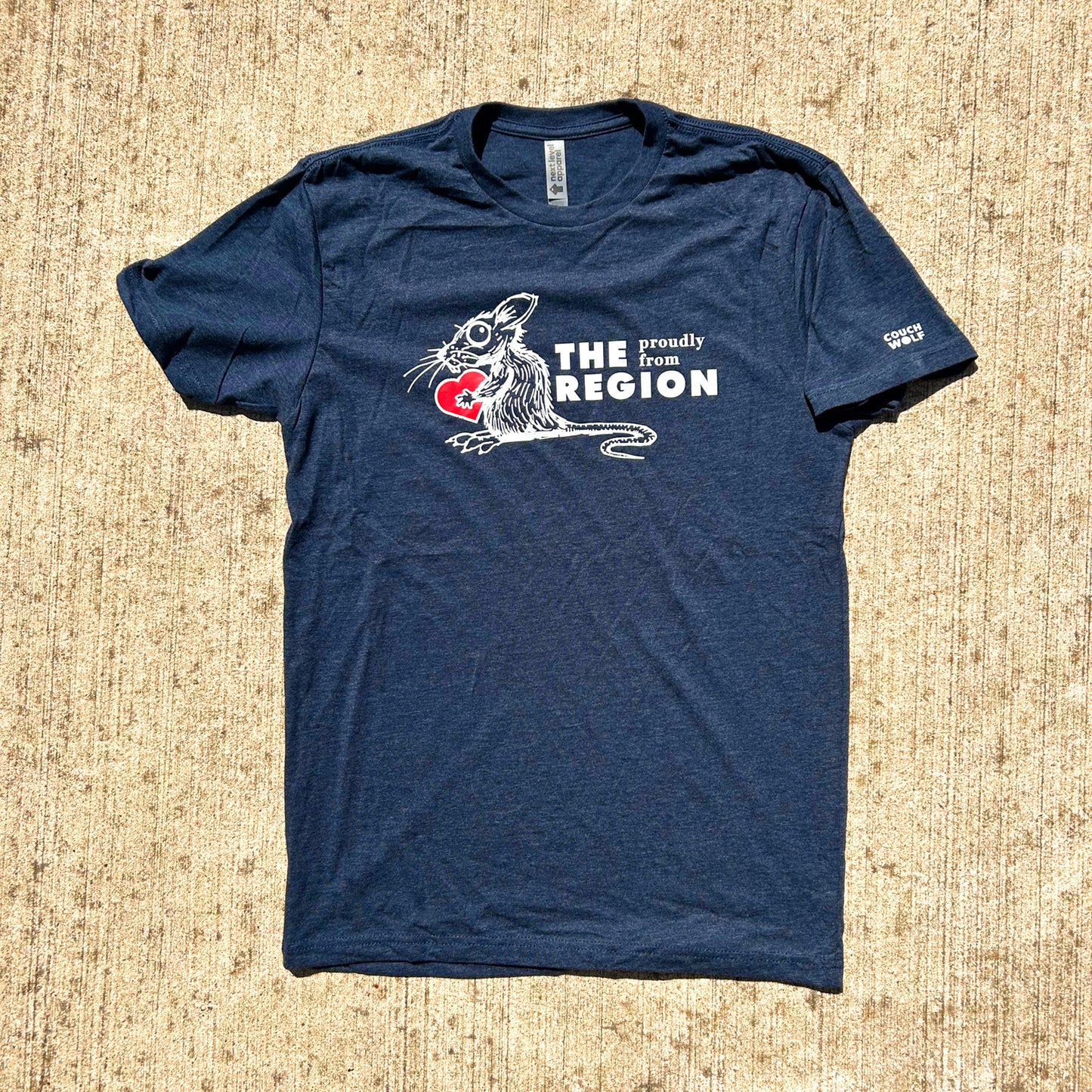 Blue the Region Rat t-shirt with graphic design and text on a textured beige surface