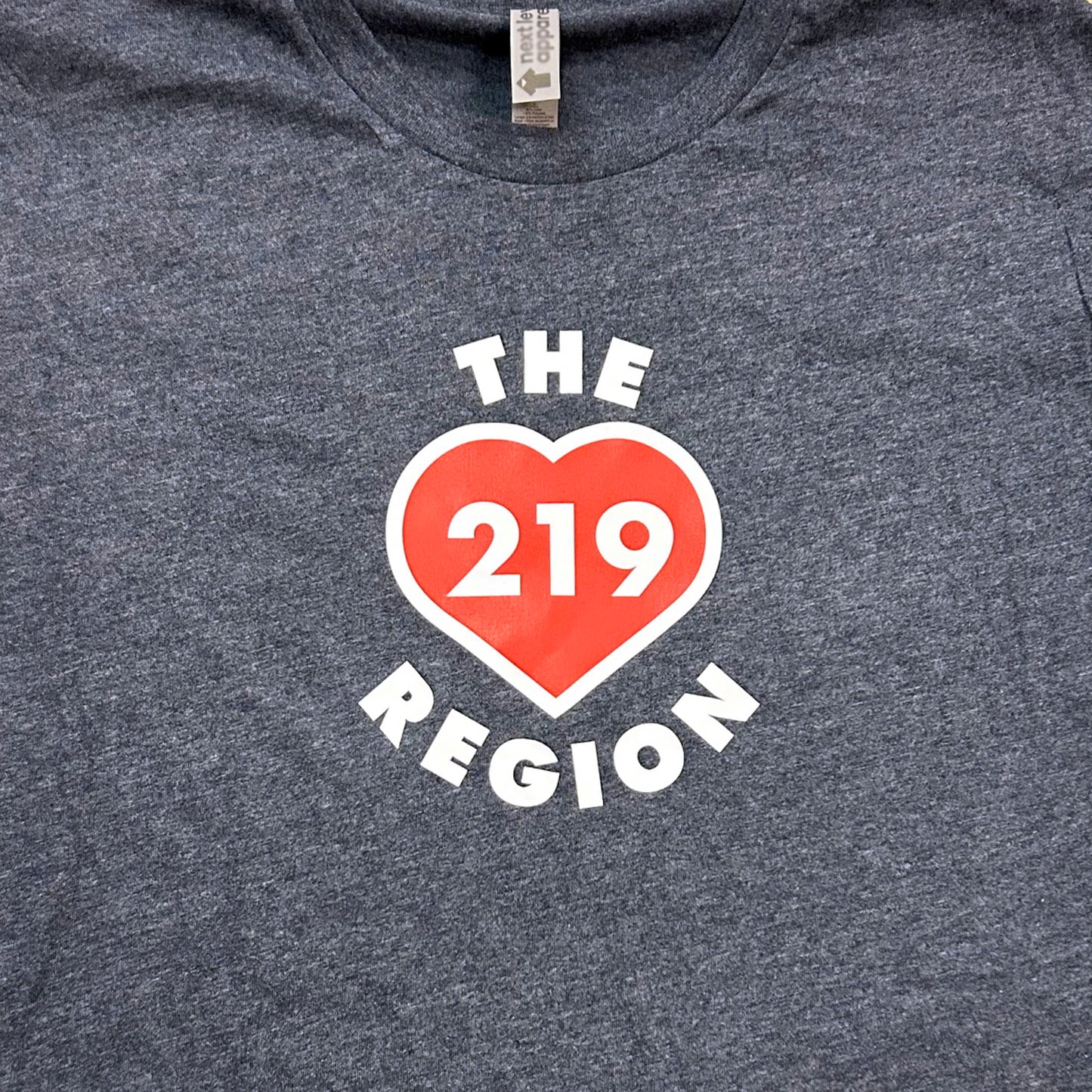 Navy blue t-shirt with a red heart and white text 'THE 219 REGION' on a plain background