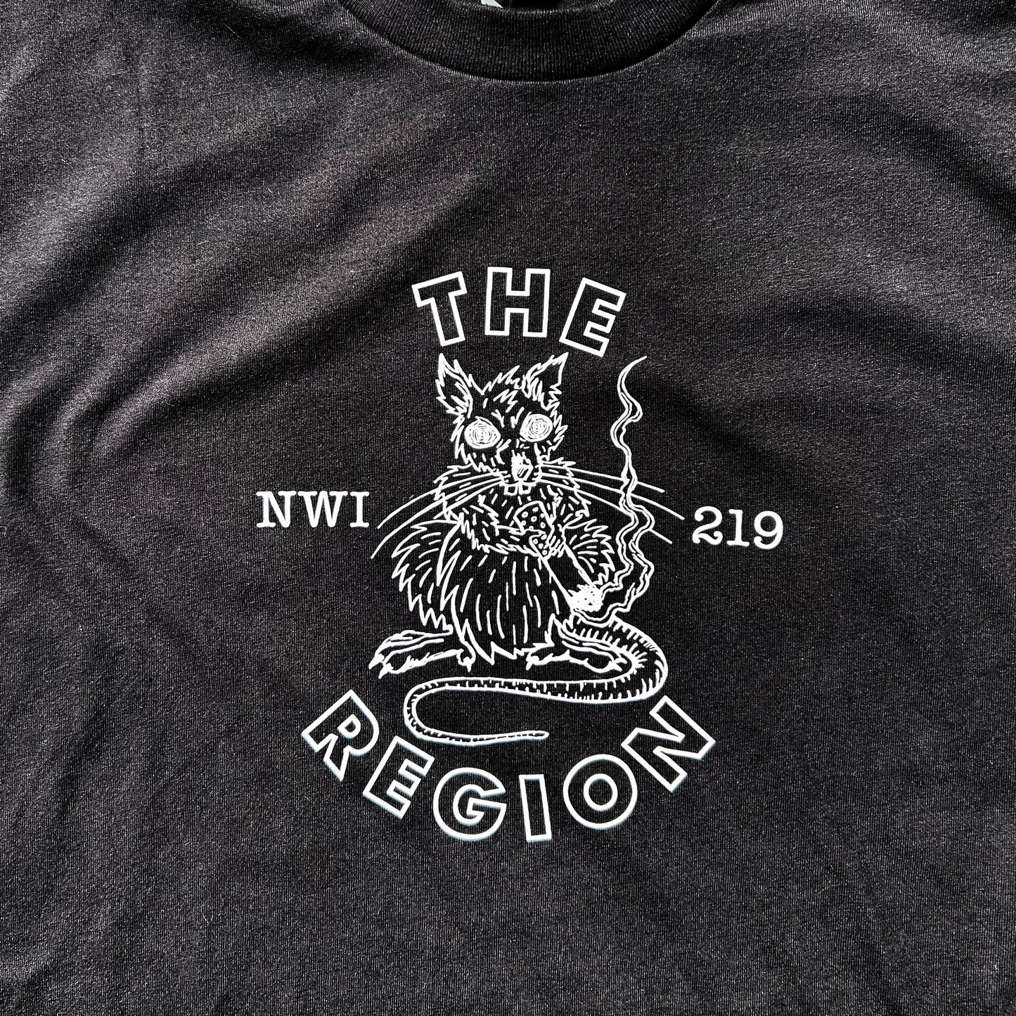 The Region Indiana Region Rat t-shirt white ink rat smoking cigarette standing upright says "the region nwi 219" funny northwest indiana shirt