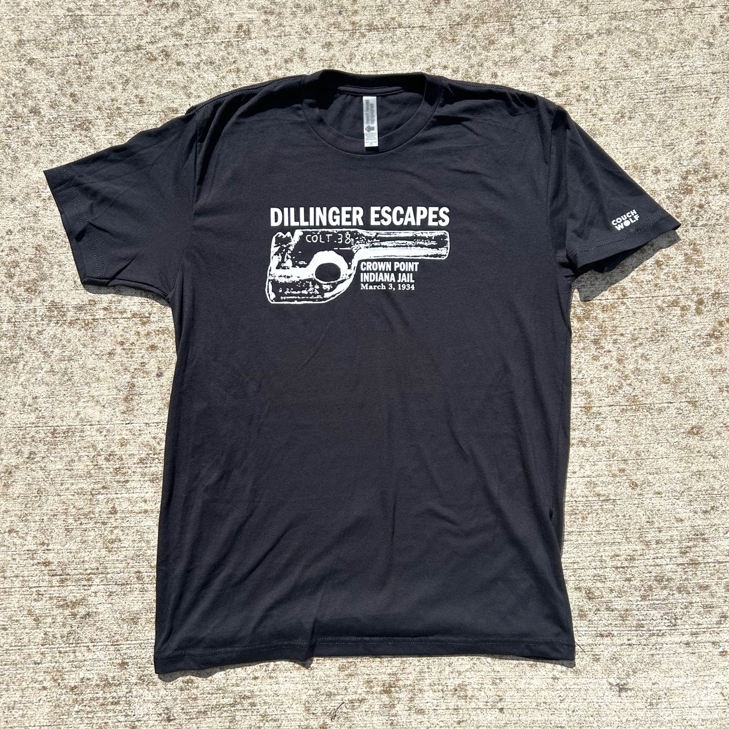 Dillinger Escapes Black t-shirt with white graphic and text on a textured surface