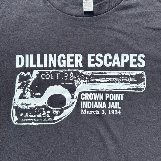 Dillinger Escapes design says Dillinger Escapes Crown Point Indiana Jail March 3, 1934 black fabric with white ink