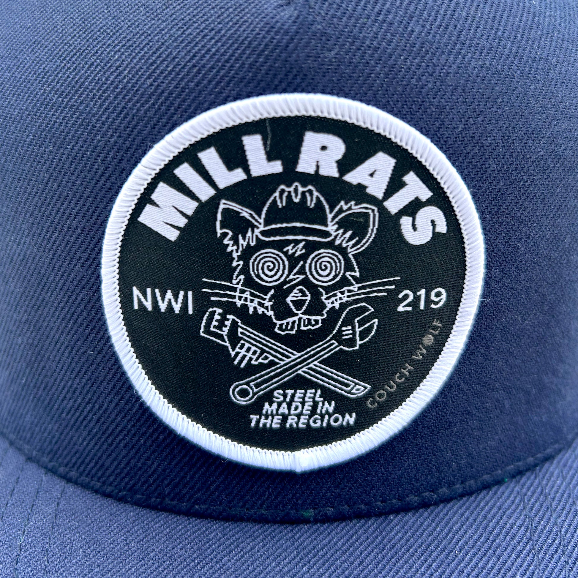Black and white 'Mill Rats' logo patch  on a blue background