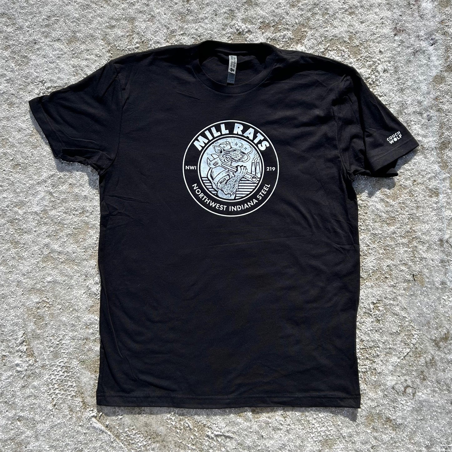 Black t-shirt with 'Mill Rats' logo on a textured surface