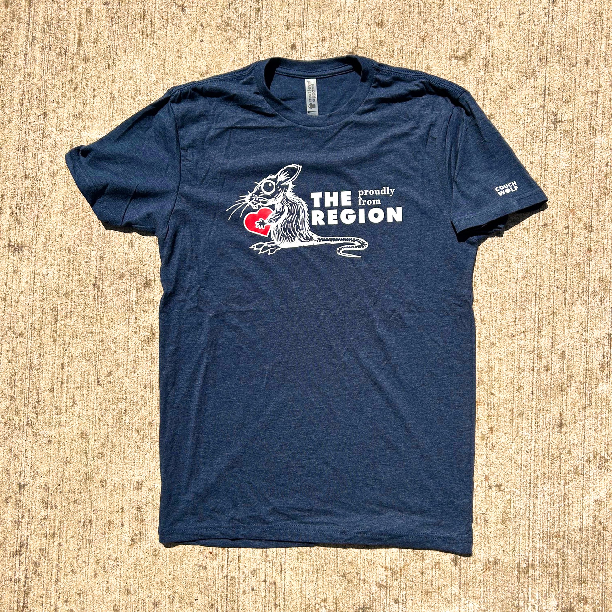 Blue the Region Rat t-shirt with graphic design and text on a textured beige surface