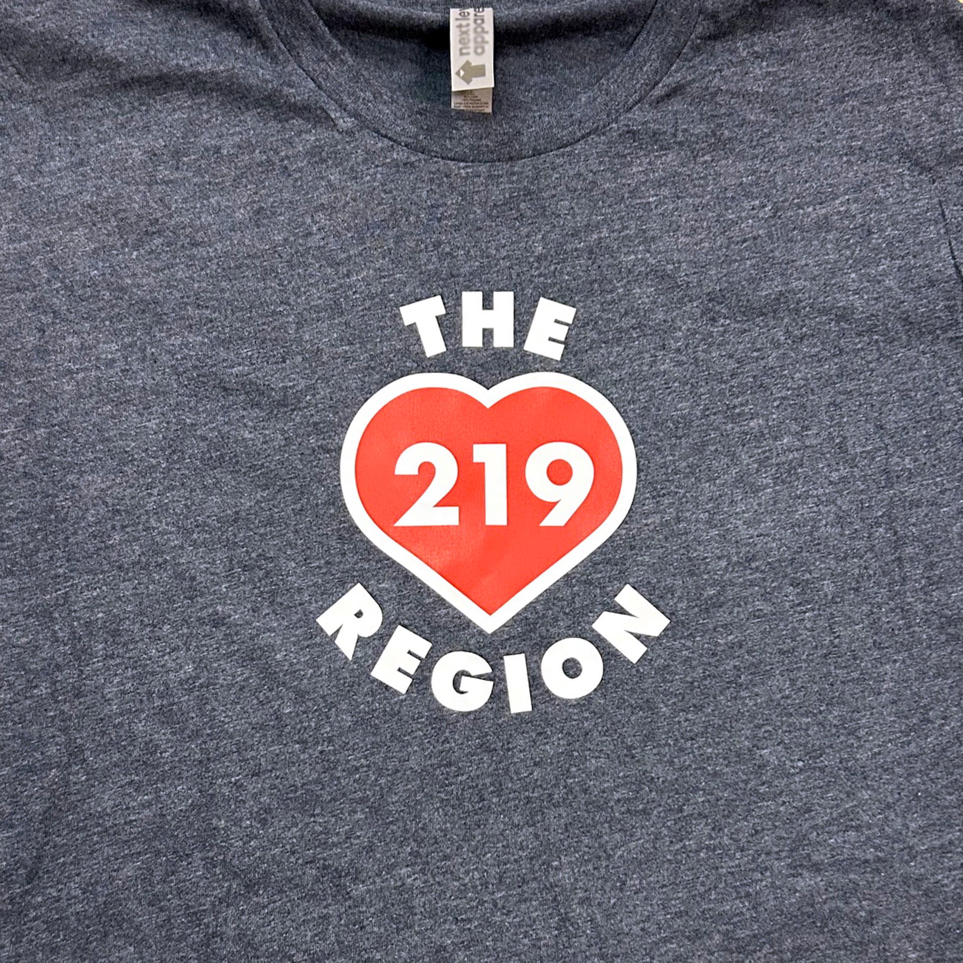 Navy blue t-shirt with a red heart and white text 'THE 219 REGION' on a plain background