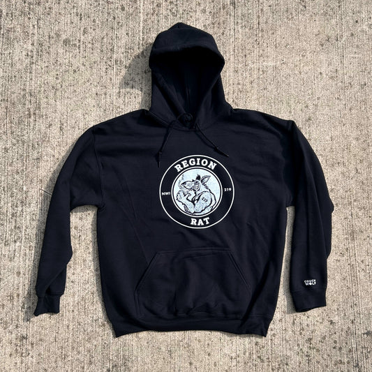 Black hoodie with a white region rat artwork on a textured surface