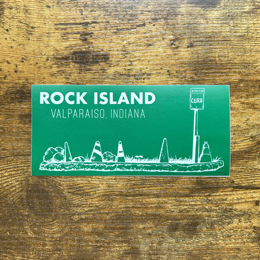 Rock Island Valparaiso Indiana Sticker green sticker with white line art of parking island rocks and road cones says "Rock Island Valparaiso Indiana" shown on wood background